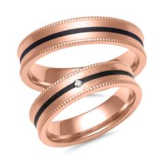 Trauringe aus Roségold und Carbon mit Diamant