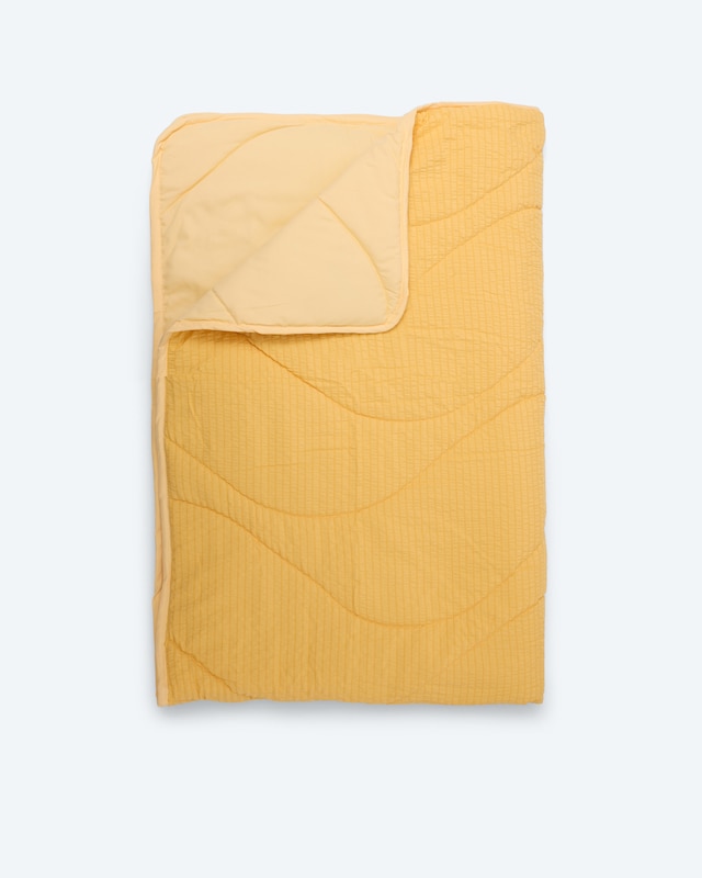 Seersucker und Peach Wendesteppbett