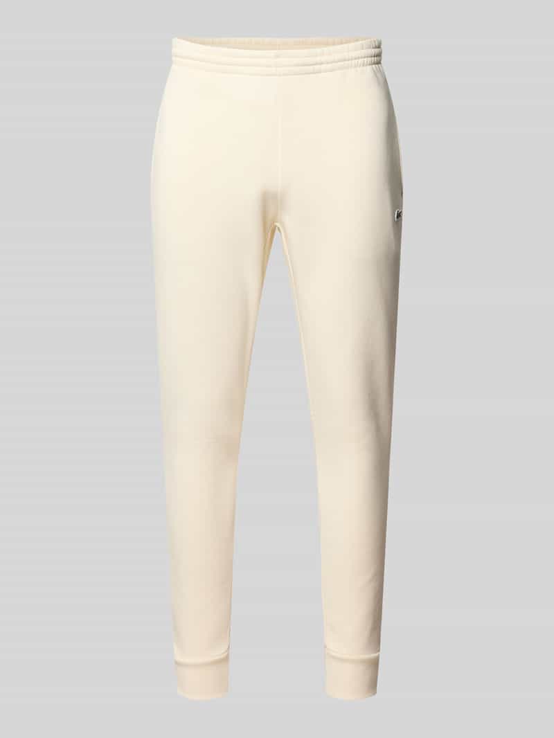Lacoste Regular Fit Sweatpants aus Baumwoll-Mix in Offwhite, Größe L