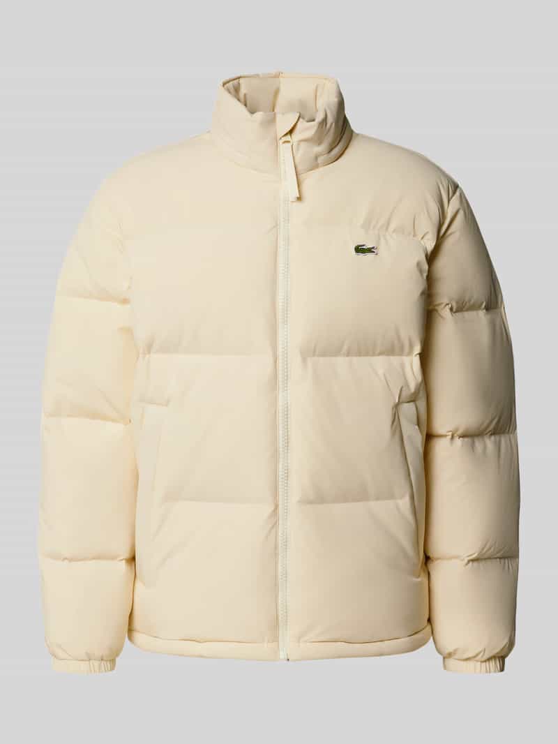 Lacoste Regular Fit Daunenjacke mit Stehkragen und integrierter Kapuze in Offwhite, Größe L