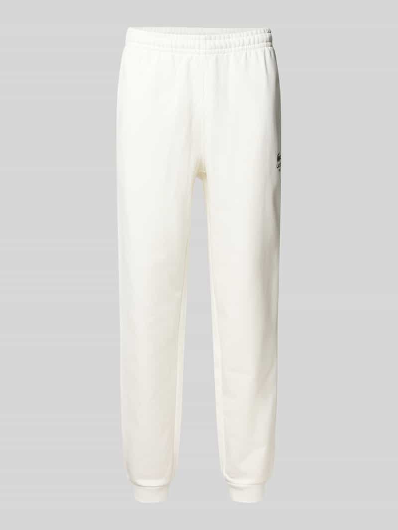 Lacoste Tapered Sweatpants aus reiner Baumwolle in Offwhite, Größe L
