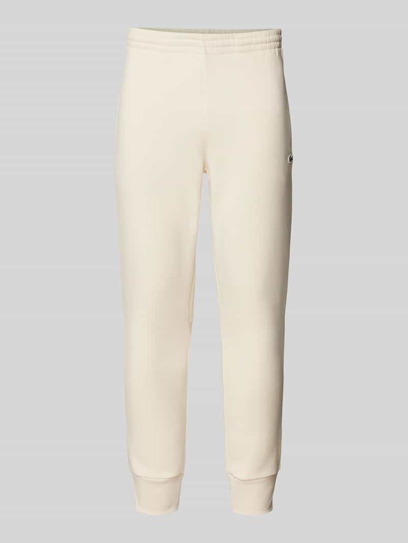 Lacoste Slim Fit Sweatpants mit Logo-Patch in Offwhite, Größe L