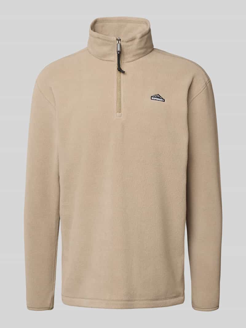 Superdry Fleecepullover mit Label-Stitching und Stehkragen in Beige Melange, Größe L