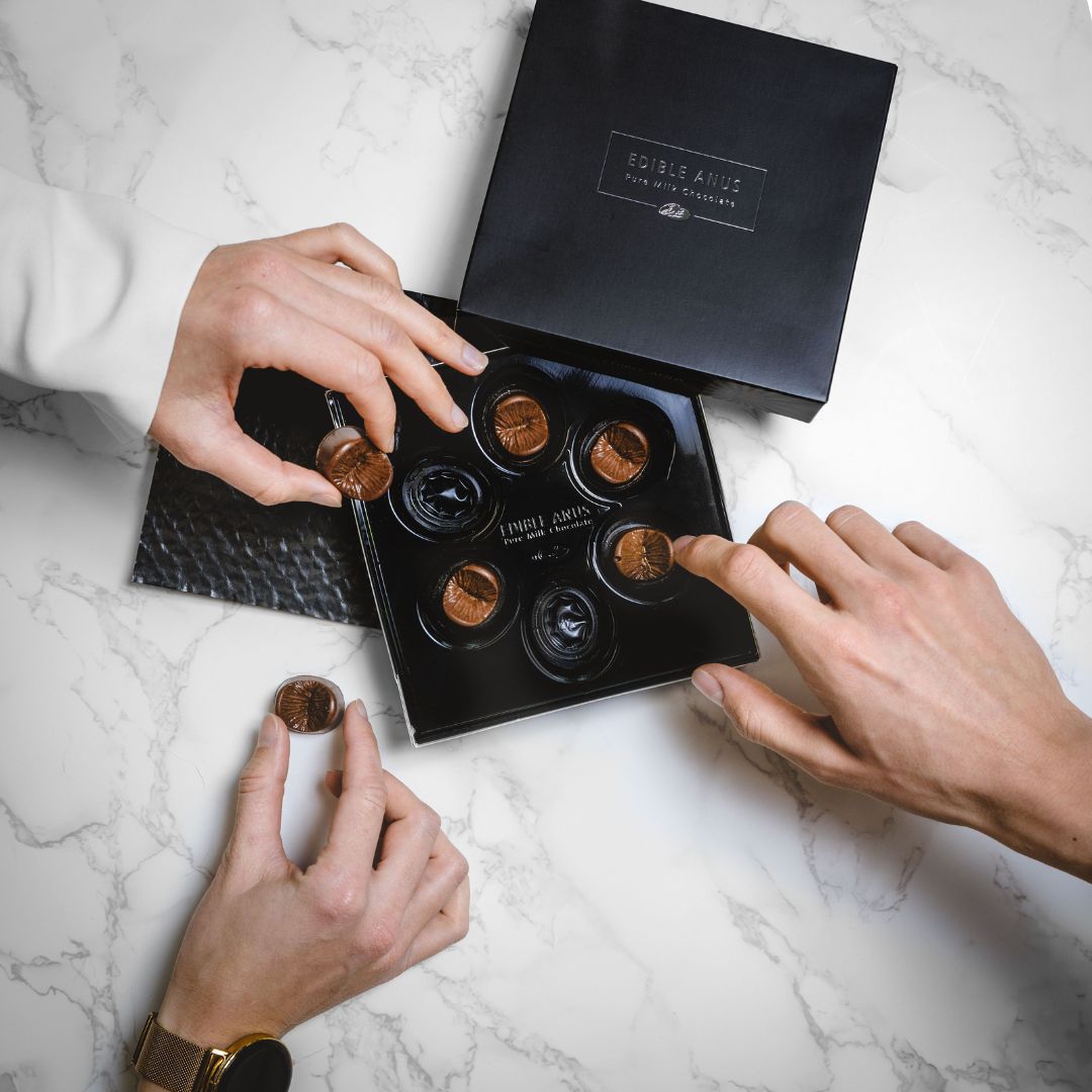 Schokoladen Arschloch, Schokolade, Belgien, Milchschoolade, weiß, dunkel, Geschenk, Kollege, Büro, Kakao, Beleidigung, Anus, Rosette, Gag, Freunde, Witzige Geschenke, Geschenk, Geschenkidee